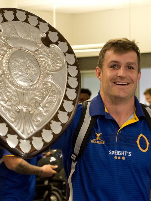 Otago captain Michael Collins is a three-time winner of the Ranfurly Shield. Proudly showing off...