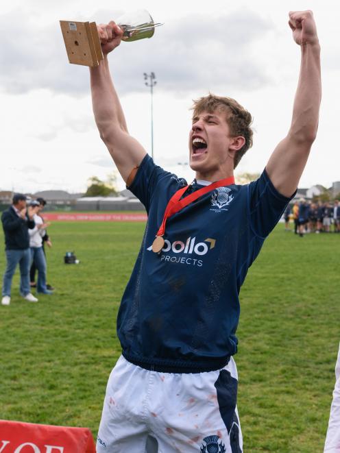 Captain Jamie Carr lifts the UC Championship cup after St Andrew's College beat Christchurch Boys...