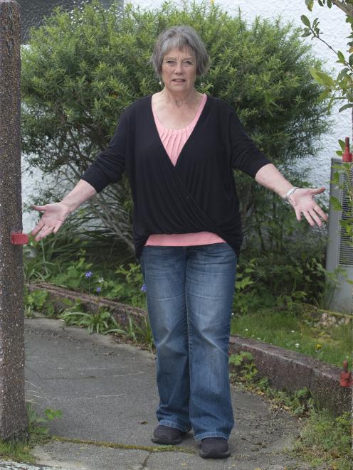 Pacific St, Dunedin, resident Phyll Esplin ponders the theft of her hefty wrought-iron gate....