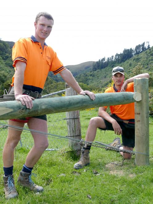 Hughes Johnston Fencing owner Isaac Johnston (left) and employee Aidan Brown put in some practice...