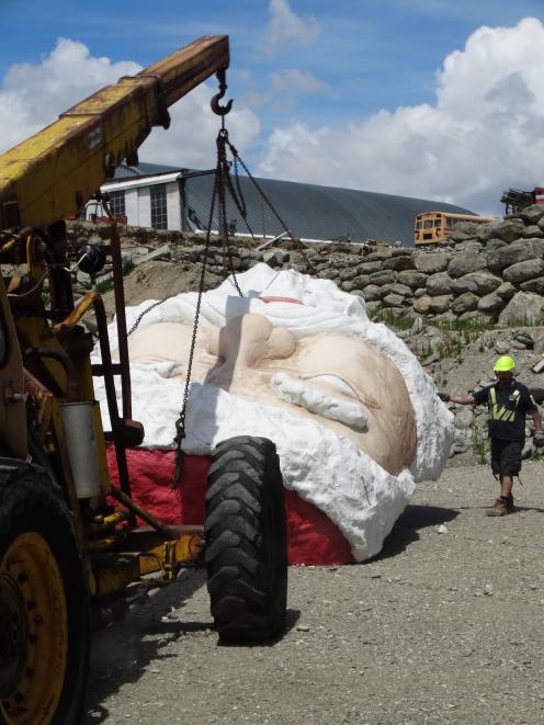 The Santa is unloaded at the Wanaka National Transport and Toy Museum. Photo: Mark Price 