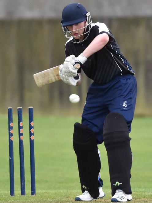 North East Valley batsman Jack Pryde plays a shot during a match against Carisbrook-Dunedin...