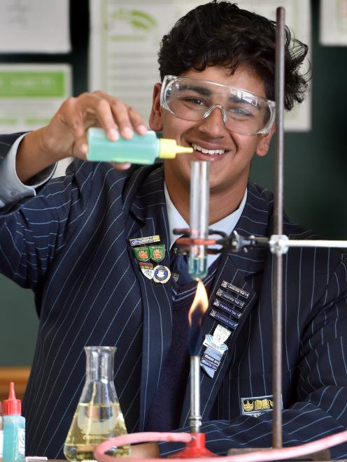 King’s High School year 12 pupil Narayan Shastri polishes his chemistry skills in preparation for...