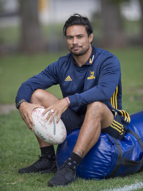 Highlanders assistant coach Shane Christie takes a break during a training session at Logan Park...