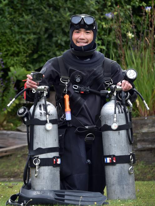 Dunedin diver Kazushi Noiri took the photo (above) of an octopus before he became the subject of...