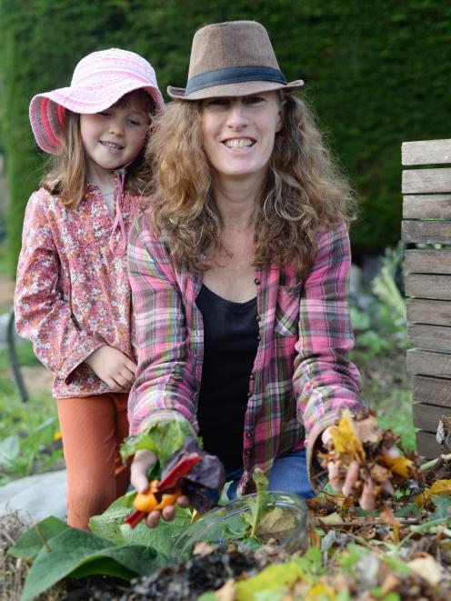 Michelle Cox, of Organics Unearthed, and Hayley Cox (6) with compost. PHOTO: MICHAELA COXFILE