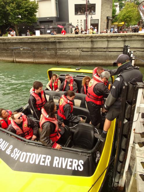 Customers disembark from a KJet boat on Queenstown’s waterfront yesterday. PHOTO: GUY WILLIAMS