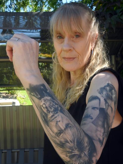Tracey Mains displays tattoos of George Michael, Freddie Mercury and David Bowie, created by...