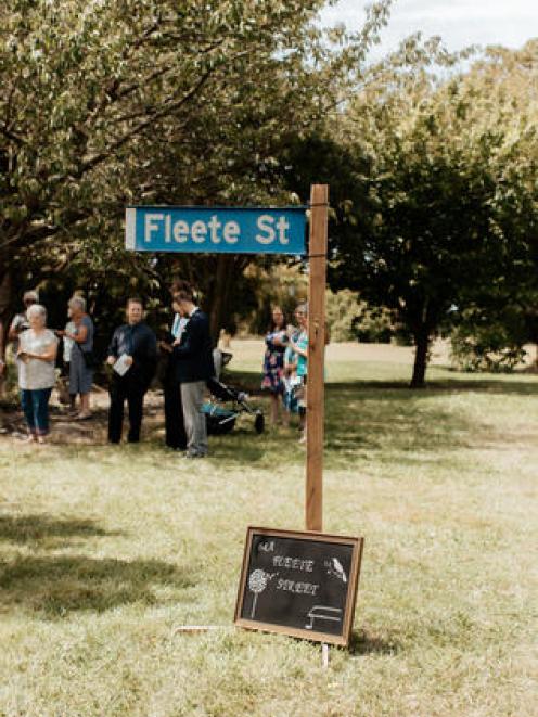 A fake Fleete St sign welcomed Katie Hantley's wedding guests to the site of her former family...