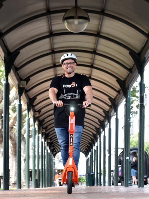 Neuron New Zealand regional manager Adam Muirson rides a Neuron Mobility e-scooter in Dunedin’s...
