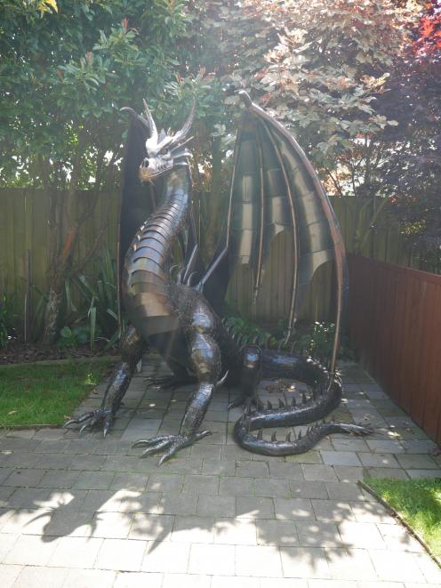 The dragon created by steel sculptor Bryce Neaves for Outram couple Kerry Smith and Pene Ngatai....