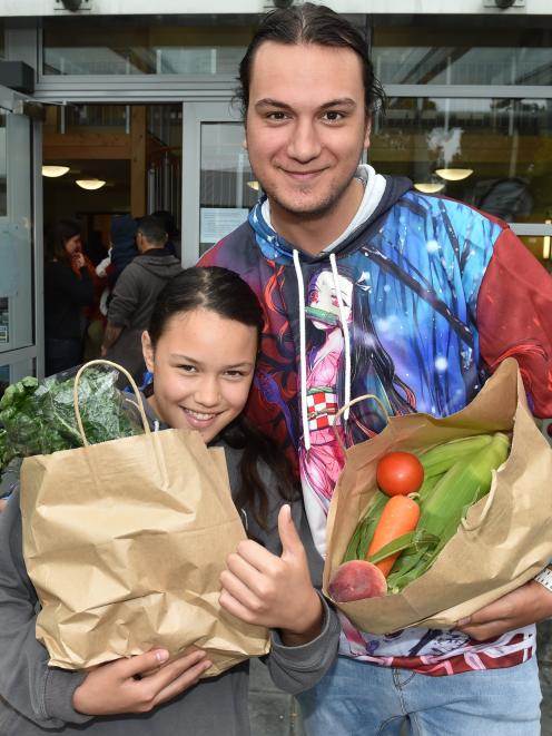 Paikea Hunter (11) and big brother Ammon stock up on produce after getting a blood  test at the...