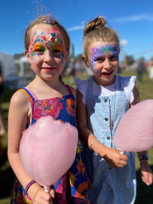 Ella Turner (8) and Ruby Dykes (7), both of Middlemarch, show off their face paint.