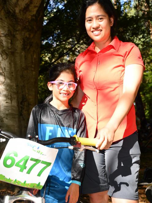 Having parked some distance from Queens Park, Madeleine (7) and Bernadette Lerios cycled an extra...
