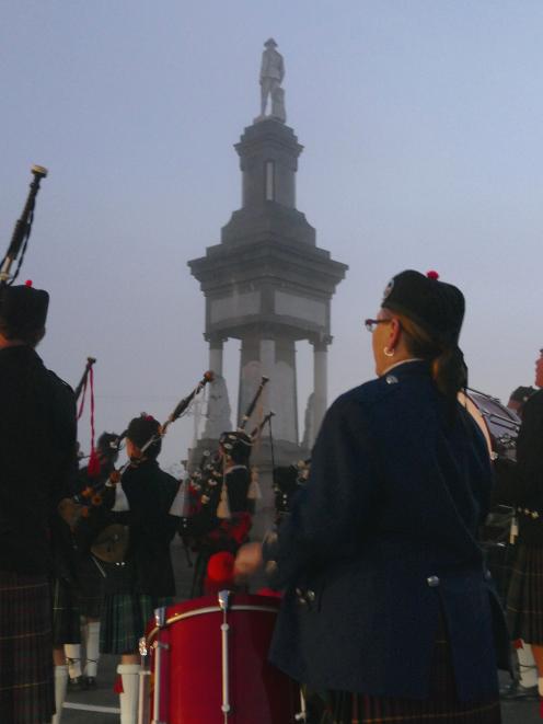 Members of the Balclutha Pipe Band open the Anzac Day dawn service at the town’s Renfrew St...