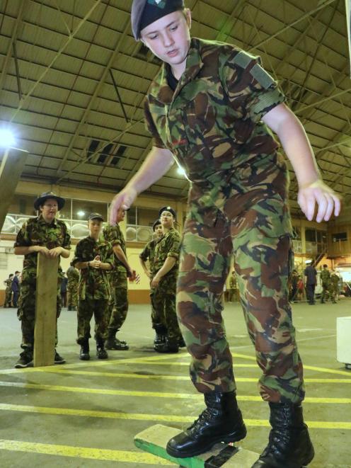 City of Dunedin Cadet Unit cadet Flynn McCormick (14), a pupil  at King’s High School, keeps his...