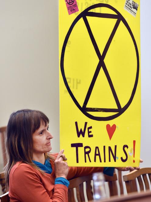 Environmentalist Jennifer Shulzitski shows her support for Dunedin’s train service. PHOTOS: PETER...