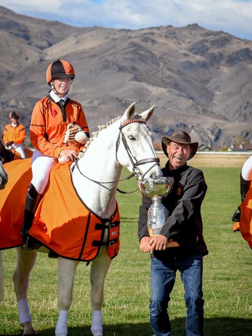 Otago-Southland coach Hamish Disbrowe holds the NZPCA Dressage Cup for highest placed MT-class...