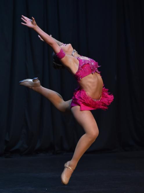Isabel Woodhouse struts her stuff on stage at the Dunedin Performing Arts Competitions Society...