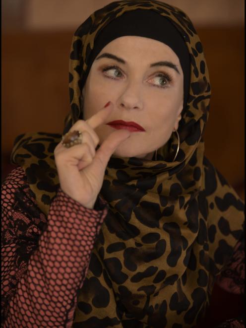 Isabelle Huppert as The Godmother.