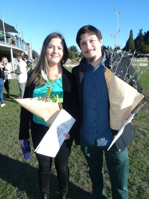 Celebrating their new status as New Zealand citizens in Queenstown yesterday are Lucia Echaniz ...