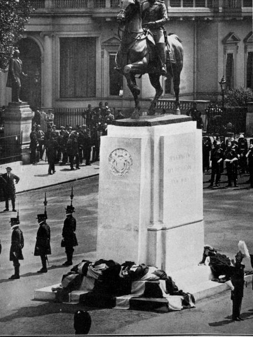 A memorial statue of King Edward VII is unveiled in Waterloo Place, London, by his son, King...