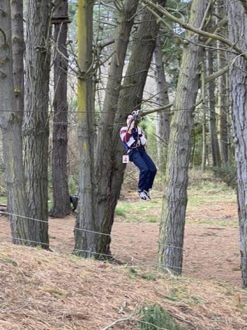 Jarod Suan on a zipline during the life skills course run by police charity, Blue Light, and the...