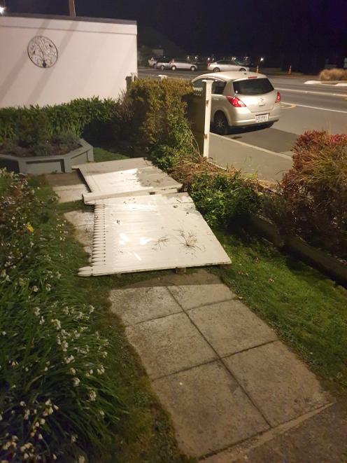  The early morning scene after a car ploughed into Lynette Harris’ fence. PHOTO: LYNETTE HARRIS

