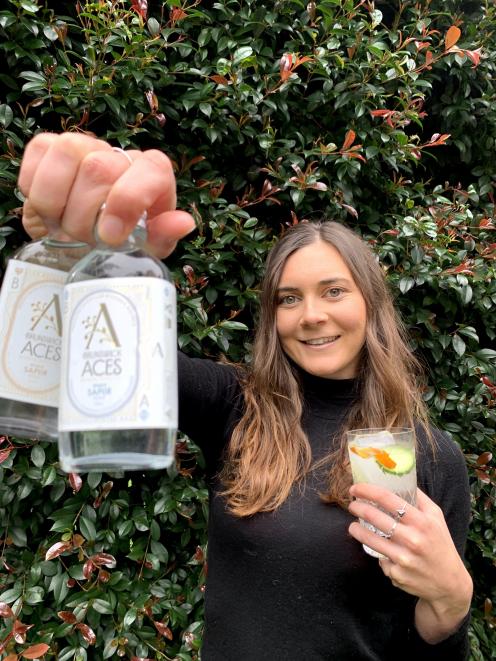 Sophie Williamson with her company’s alcohol-free ‘‘gin’’. PHOTO: SUPPLIED