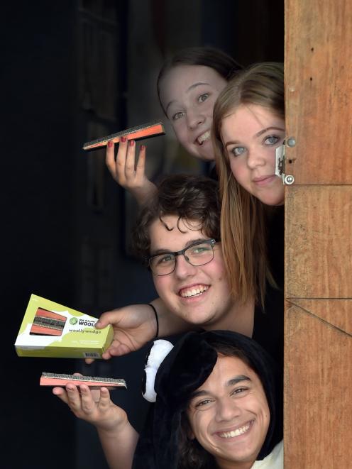 Celebrating their win after the Young Enterprise Scheme’s Otago Regional Final are Under the Door...