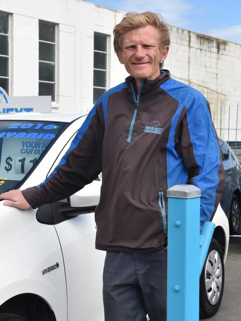 Your Next Car Dunedin owner Steve Warrington with the most imported car into New Zealand last...