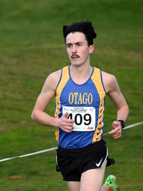 Oli Chignell strides to victory in the New Zealand cross-country championships at Chisholm Links...