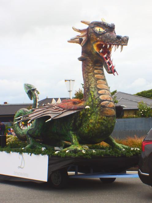 The Old Dragon, the newest float in the parade, made it to the city-wide tour on Saturday.