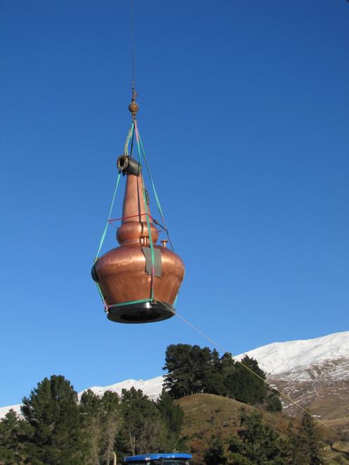 In June, 2015, the copper whisky still made by Forsyths, of Rothes, Scotland, is hoisted into the...