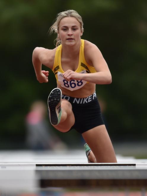 Sarah Jamison (17), of the North Otago team, in the 100m hurdles.