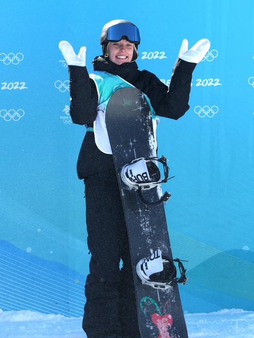 Zoi Sadowski-Synnott reacts after her run during the Women’s Snowboard Big Air qualification...