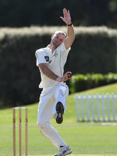 Otago paceman Michael Rae concentrates as he is about to unleash a delivery against Wellington at...