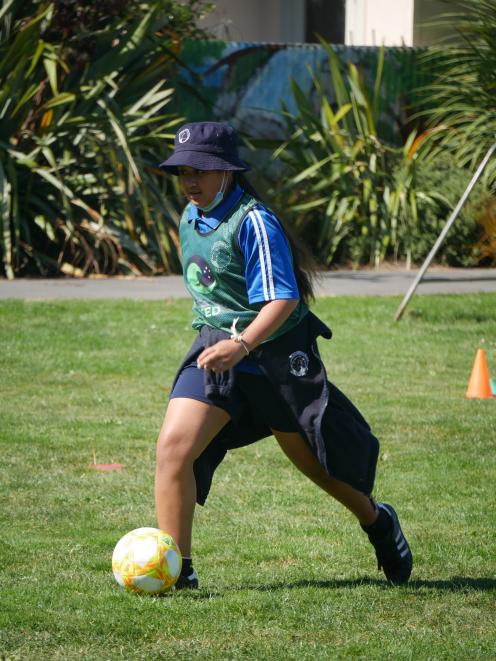 Carisbrook School pupil Amaiyah Tanuvasa (10) prepares to kick the ball towards the goal. PHOTOS:...