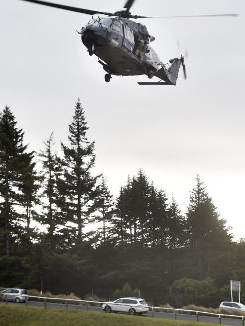 The NH90 helicopter comes in to land at the Otago Boys’ High School sports fields yesterday.