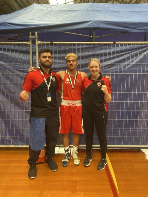 National under 71kg youth title winner Hamuera Tainui with Woolston Boxing coach Trevor Swainson...