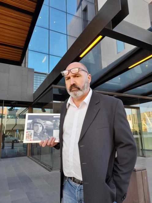 Geoff Booth outside the district court, where an inquest was held into the suspected suicide of...