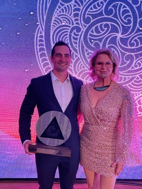 K&J Growth co-founder Kale Panoho holds his award at the Whakaata Maori 2022 Matariki Awards in...
