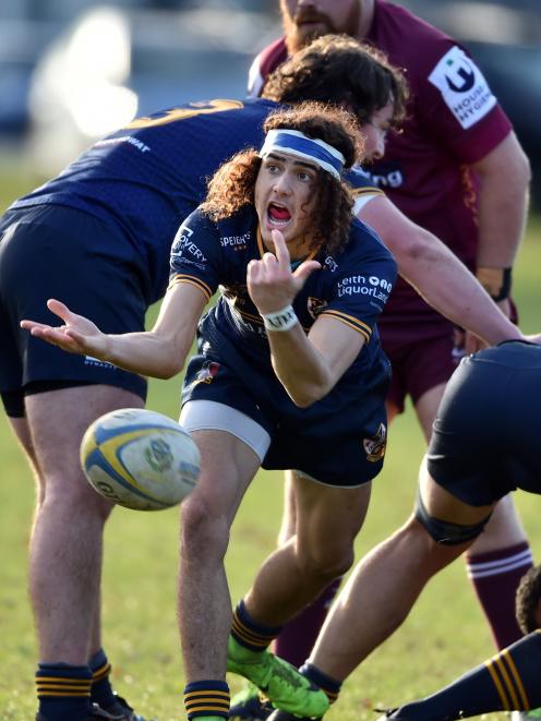 Dunedin halfback Devon Olliver-Bell passes the ball during a premier match against Alhambra-Union...