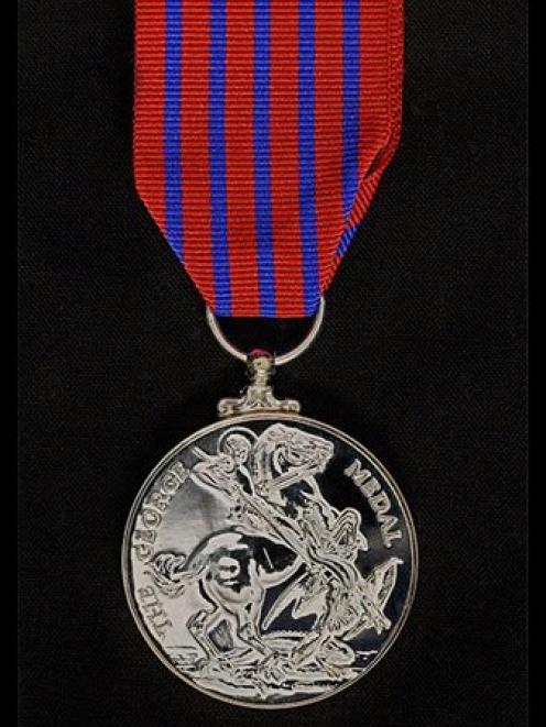 Mr Spary received the George Medal in 1975 for a daring helicopter rescue of a climber. PHOTO:...