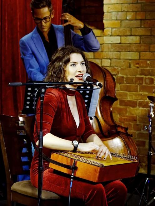 Simona Smirnova plays the kankles, a Lithuanian folk instrument based on the zither. PHOTO: GEOFF...