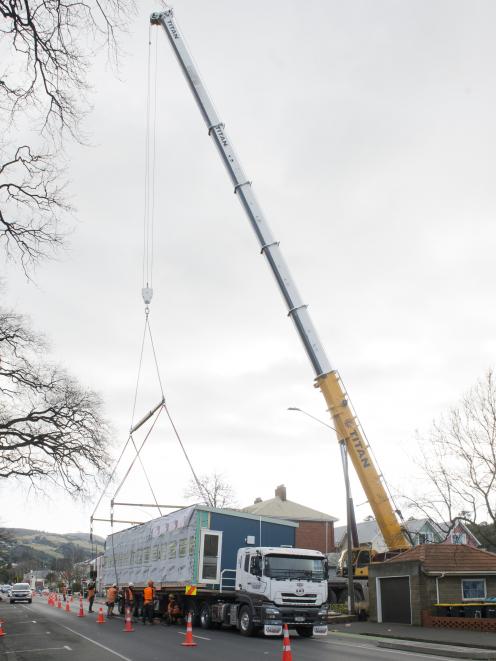 Poised to be placed on the site of the All Saints Anglican Church in Dunedin yesterday are...