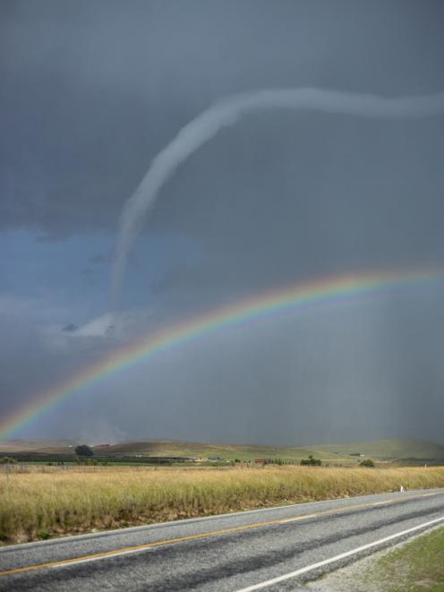 The tornado above a rainbow. Photo: CONNOR DIVER