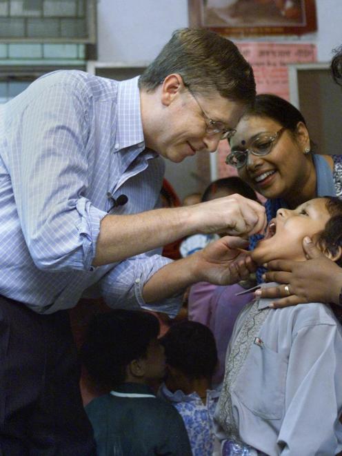 Then Microsoft chairman Bill Gates, co-founder of the Bill & Melinda Gates Foundation,...