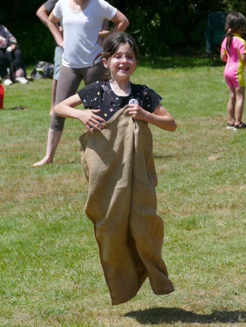 Katie Milne (7), of Invercargill, takes pole position in the sack race. PHOTOS: RICHARD DAVISON