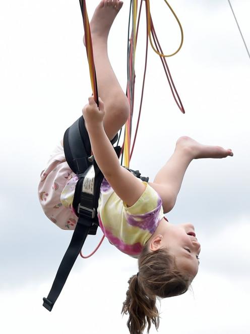 Alaiyah Ellis-Fuli (4), of Dunedin, gains some air.